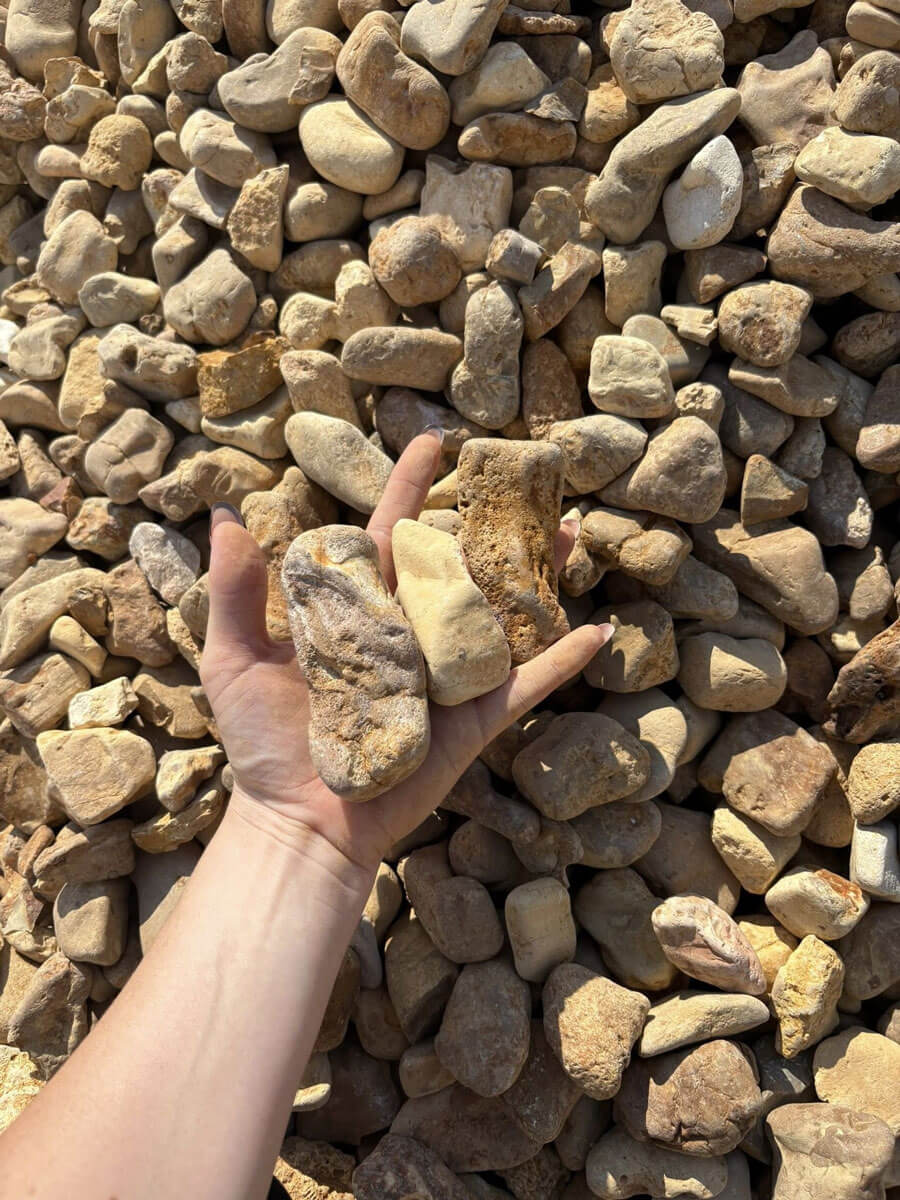 Clean oversize rock for erosion control and drainage